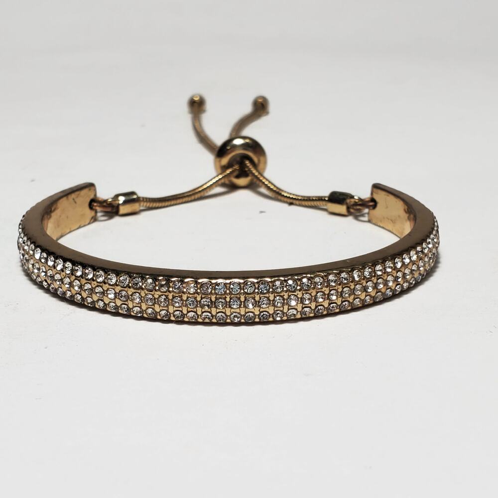 Pavé Rhinestone Triple Row Curved Bar Slider Gold Tone Bracelet
